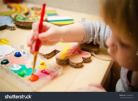 Stock Photo Little Female Baby Painting With Colorful Paints Selective