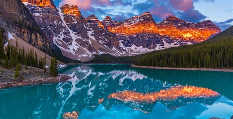 The Bright Blue Water Of Moraine Lake Makes It A Picture Perfect Spot