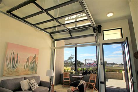 Given the fact that the door opens vertically and is suspended under the ceiling, this allows you to use the space inside and in front of the garage. Home Interiors: Glass Garage Doors