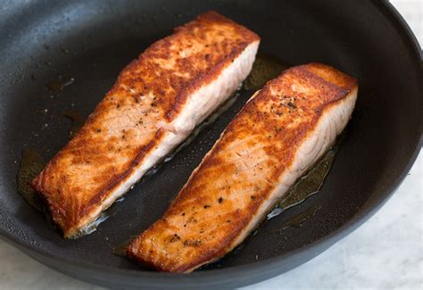 If you use salmon with skin, simply cook it skin side up the entire time. Salmon (with Creamy Garlic Dijon Sauce) - Cooking Classy