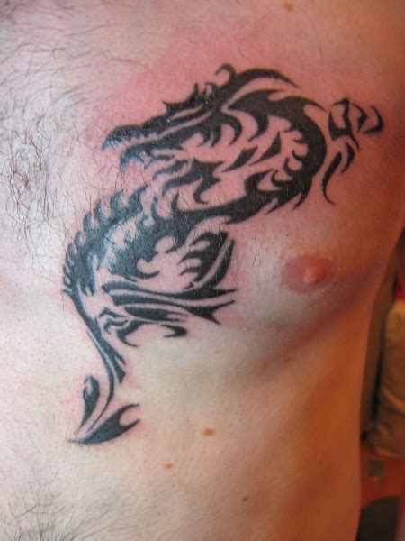 Dragon tattoo drawings for men. 22 Beautiful Tribal Dragon Tattoo | Only Tribal