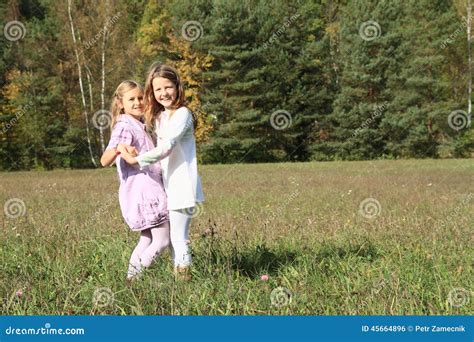 Kids Girls Dancing On Meadow Stock Photo Image Of Cutie Girl 45664896