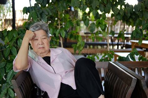 Sleepy Depressed Fatigued Sad Upset Asian Old Asian Elderly Senior Elder Woman Stock Image