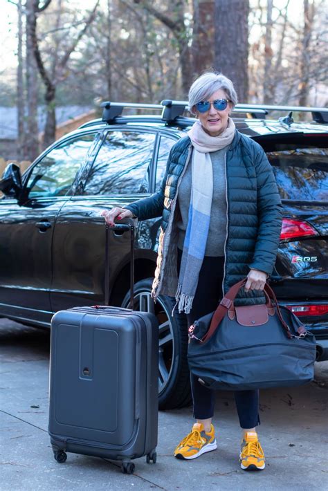 how to dress for the airport fashion tips and tricks for packing and flying airport style winter