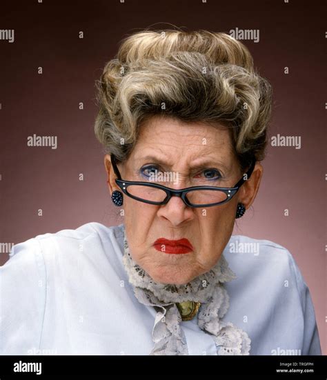 Grumpy Old Lady Wearing Glasses Stock Photo Alamy