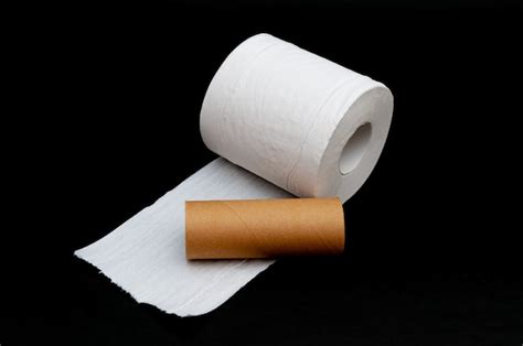Premium Photo Single Roll Of Unrolled White Toilet Paper And Paper