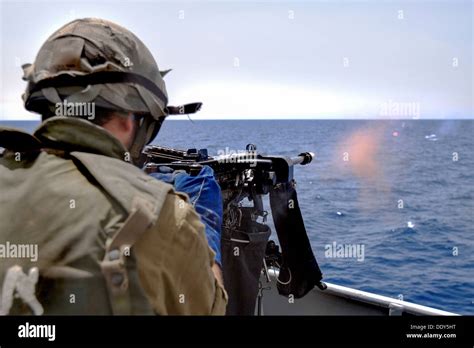 Israeli Navy Missile Boat Class Saar 45 Soldier Firing A Machine Gun