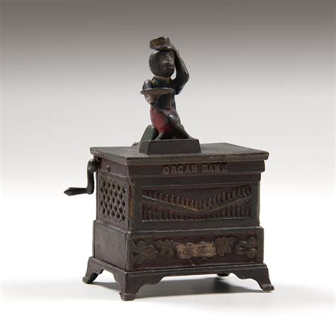 Cooling can slow down the process but cannot stop it. Kyser & Rex Organ Medium Mechanical Bank | Cowan's Auction ...