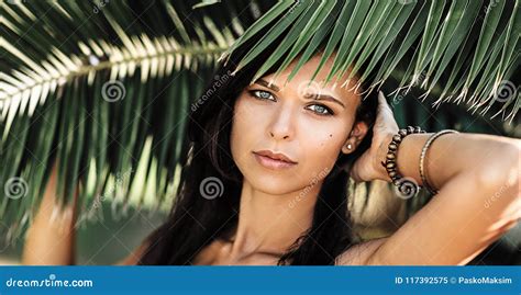 Portrait Of A Beautiful Woman In Palm Leaves Stock Image Image Of