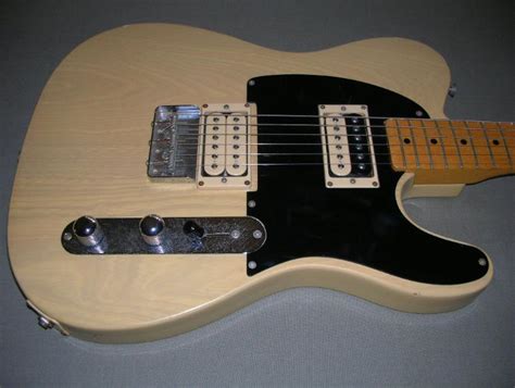 Anyone know of a Vintage Style Tele bridge that holds a humbucker