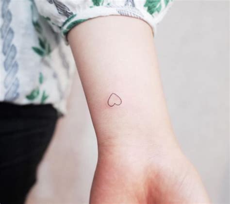 Heart Tattoos On Wrist 40 Tiny Hearts On Wrists For Girls
