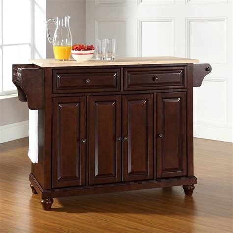 This seemingly normal kitchen island has hidden wheels which allow it to serve as additional counter space or as a small dining spot. Crosley Furniture Brown Craftsman Kitchen Island at Lowes.com