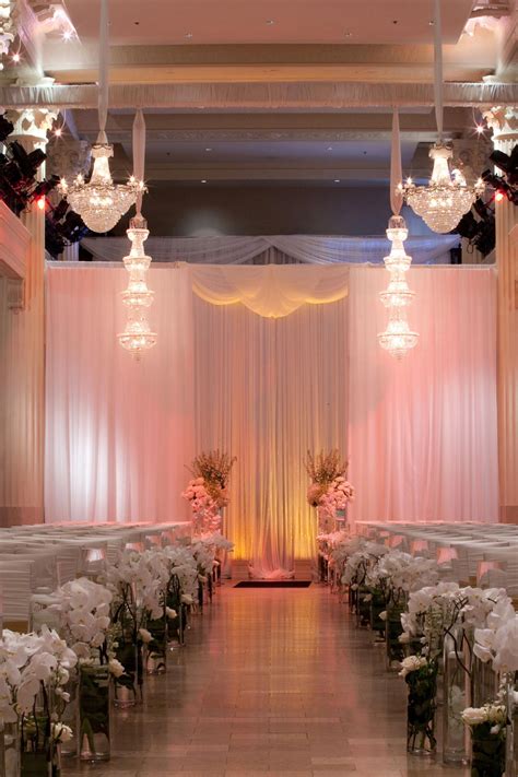 The Couples Ceremony Space Was Decorated With Elegant Drapery
