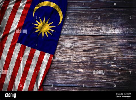 Malaysian Flag On Rustic Wooden Background For Malaysia National Day