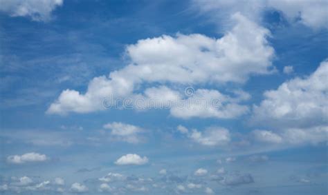 Beautiful White Fluffy Cloud Formation On Vivid Blue Sky Know As