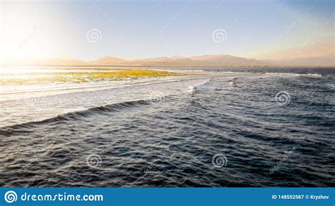 Beautiful Landscape Of Calm Ocean And The Mountains On The Coast Sea