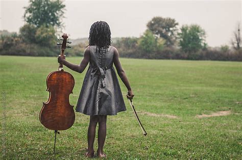 Cello And Girl By Gabriel Gabi Bucataru Stocksy United