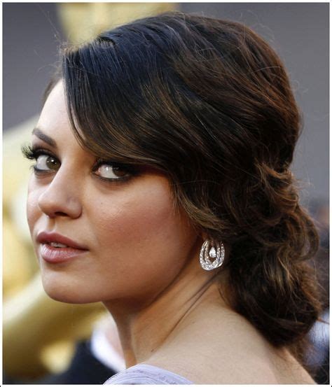 Mila Kunis With A Low Wavy Updo Hair Updos Oscar Hairstyles Wavy Updo