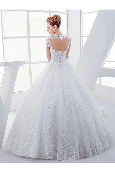 It may be also due to the fact that every woman dreams to look like a queen or princess in the bridal day and so, she makes this. Lace Ball Gown Keyhole Back Sparkly Wedding Dresses Bridal ...