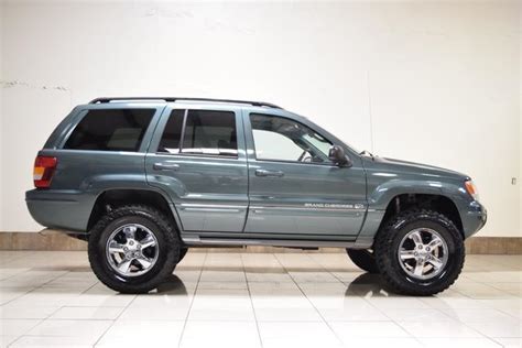 View photos, features and more. 2004 JEEP GRAND CHEROKEE LIFTED OVERLAND 4WD QUADRA-DRIVE ...