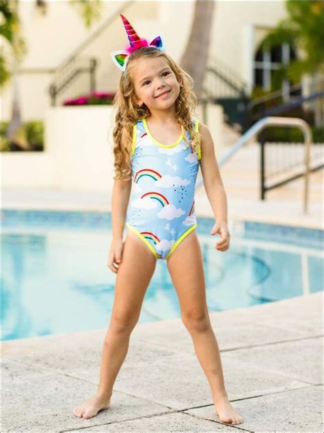 your little beach sweetie can splash the day away in style with this