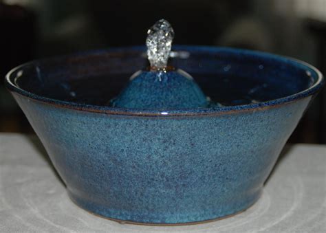Set your cat's water bowl in a small plastic bin. Handmade Food-safe Ceramic Cat Fountain Carnival | Etsy ...