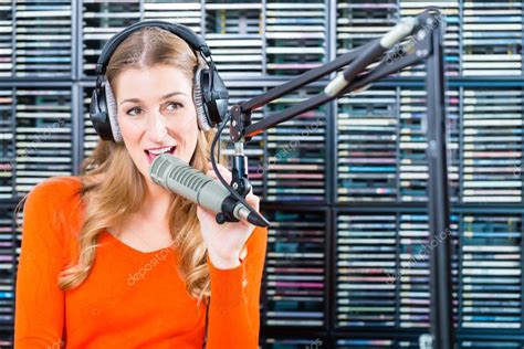 Female Radio Presenter In Radio Station On Air Stock Photo By ©kzenon