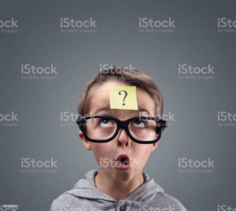 Confused Boy Thinking With Question Mark Stock Photo - Download Image ...