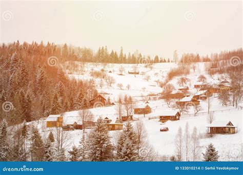 Snow Covered Hills Forest And Houses In The Distance Winter La Stock