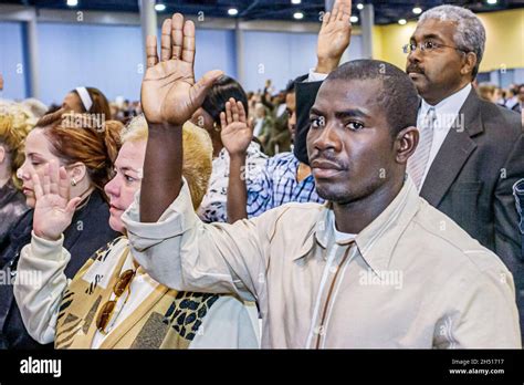 Immigrants Swearing In Right Hands Hand Raised Black Man Hi Res Stock