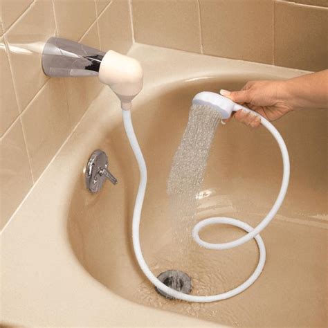 The smaller adaptor converts a standard kitchen faucet thread into 1/2. bathtub-sprayer Images - Frompo - 1