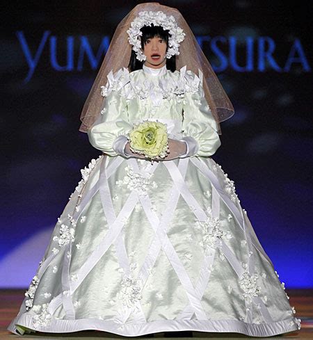 Wedding dress (or bridal gown), a special dress worn by the bride. Robot Built To Model Wedding Dresses - Geekologie