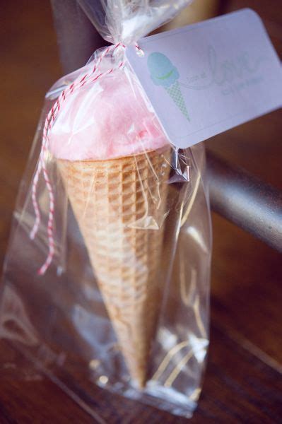An Ice Cream Cone Wrapped In Plastic With A Tag