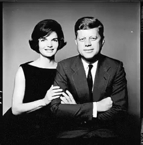 john f kennedy smiling with jacqueline