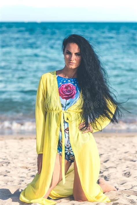 Young Woman Posing On The Tropical Beach Of Bali Island Indonesia