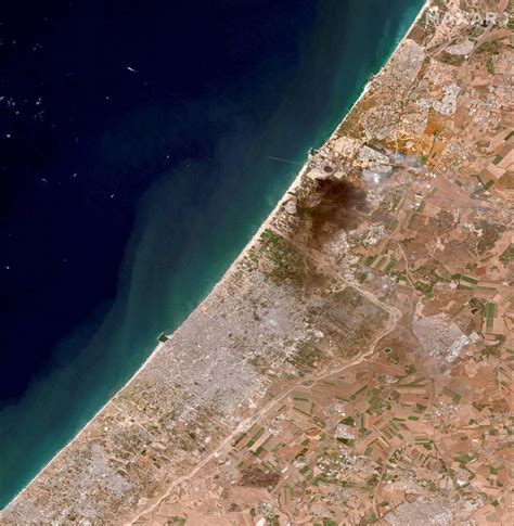 Satellite Photos Show Leveled Buildings And Plumes Of Smoke In Gaza