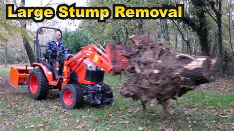 Large Tree Stump Removal With A Kubota Compact Tractor B2261 And The
