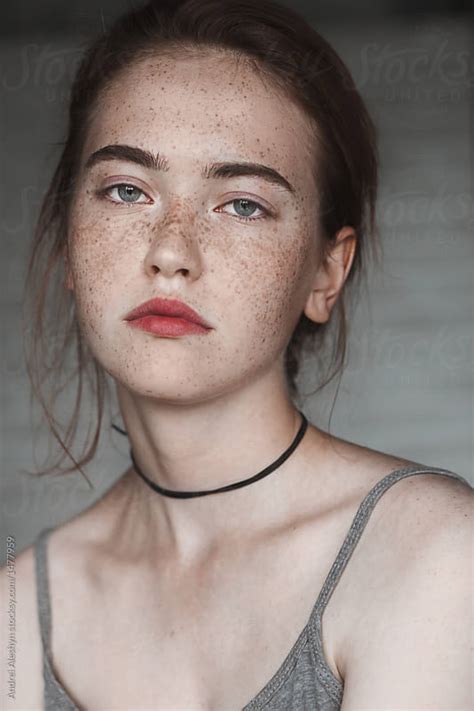 Young Girl With Freckles Close Up By Andrei Aleshyn Stocksy United