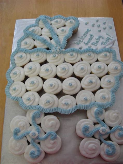 In many countries all over the world, baby shower has been celebrated as. Baby Shower Baby Carriage Cupcake Cake Pictures, Photos ...