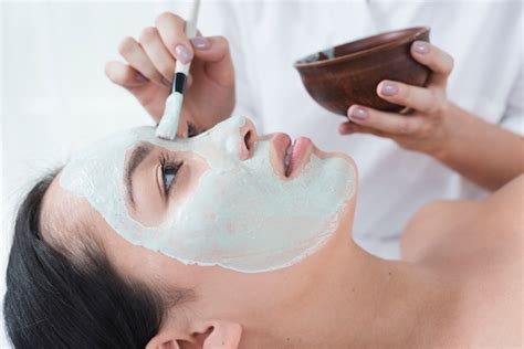 Woman With A Facial Mask In A Spa Photo Free Download