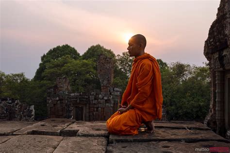 Buddhist Monk Praying At Sunset Angkor Cambodia Royalty Free Image