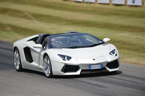 Lamborghini aventador vs ferrari f12 berlinetta top speed (370 km/h) and rev battle and amazing sounds! Lamborghini Aventador Roadster-2013 Goodwood Festival of ...