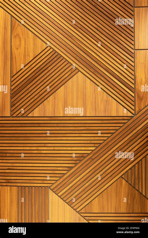 Designer Walnut Veneer Panel Geometric Crisscross Pattern Wood Wall Architectural Background