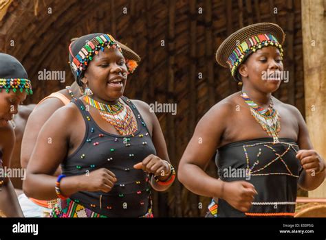 Zulu Maidens Dancing In Traditional Dress In South Africa At The Phezulu Park In Kwazulu Natal