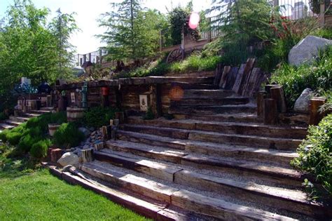 If you have a slope that is need of a retaining wall and have access to railroad ties, this is the perfect project for you! Steps of Railroad Ties | Landscaping retaining walls ...