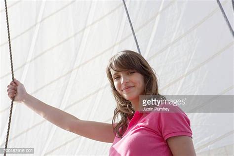 Young Woman On Sailboat Photos And Premium High Res Pictures Getty Images