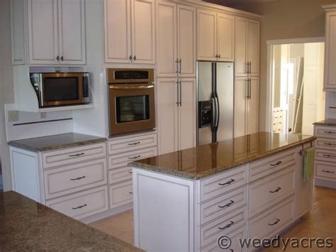 The kitchen door handles' primary function is to make furniture or cupboards easily accessible by offering a handgrip with which to open them. Finished Kitchens Blog: weedyacres' Kitchen
