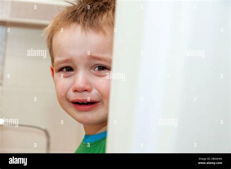 Portrait Of Crying Baby Boy In Home Stock Photo Alamy