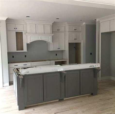Like most paint colors, agreeable gray will look agreeable gray looks great in kitchens especially with white cabinets. Walls SW Repose Gray. Island Gauntlet Gray satin. White ...