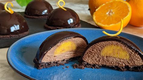 Chocolate Mousse Domes With Orange Insert And Chocolate Mirror Glaze Chocolate And Orange